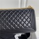 BOY Chanel FLAP BAG WITH HANDLE Lambskin & Gold Metal Black A