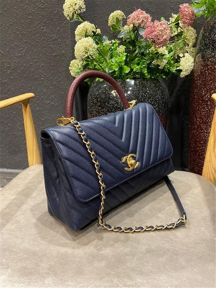 FLAP BAG WITH TOP HANDLE Chevrons Pattern Grained Calfskin Navy Blue Gold Metal High