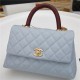 SMALL FLAP BAG WITH TOP HANDLE Grained Calfskin Light Blue Gold Metal High