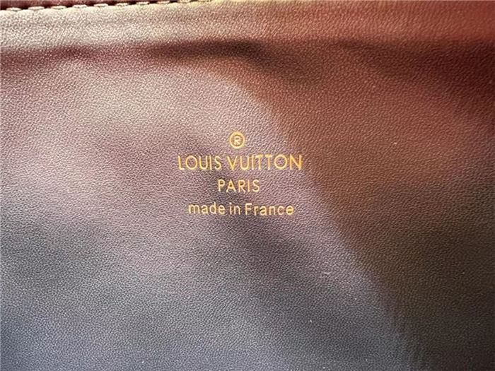 Louis Vuitton COUSSIN PM Monogram-embossed puffy lambskin High