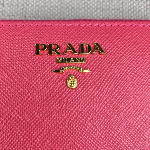 Prada Zipped Wallet In Pink Saffiano Leather High